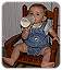 Anna-at-Doug-and-Pats-in-a-little-rocking-chair-083003