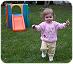 Anna-playing-in-back-yard-with-Little-Tykes-slide-032704